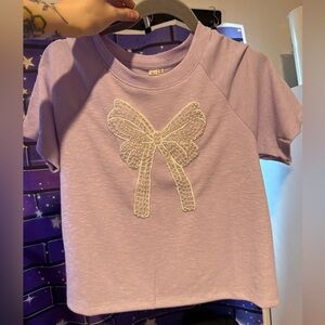 NWT Hayden Lavender Short Sleeve Top with Beaded Bow Detail- size Medium